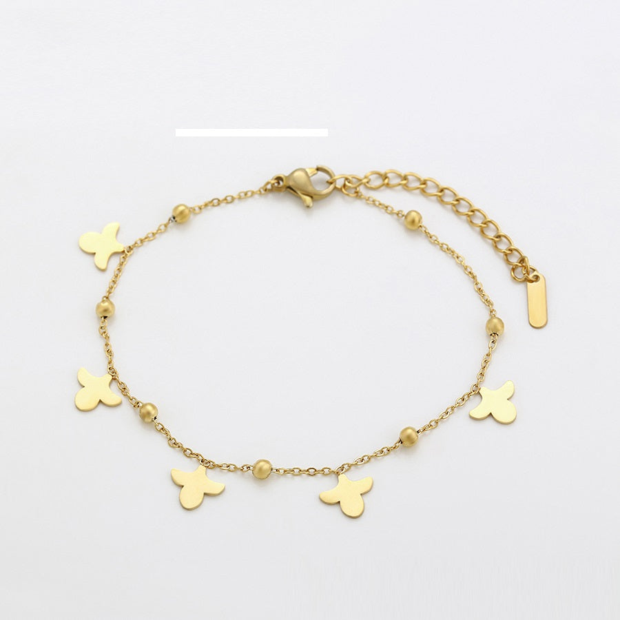 Gold Ace design in braclate